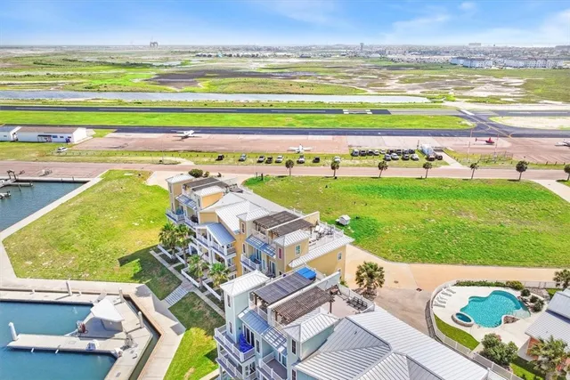 a view of a swimming pool with an ocean view