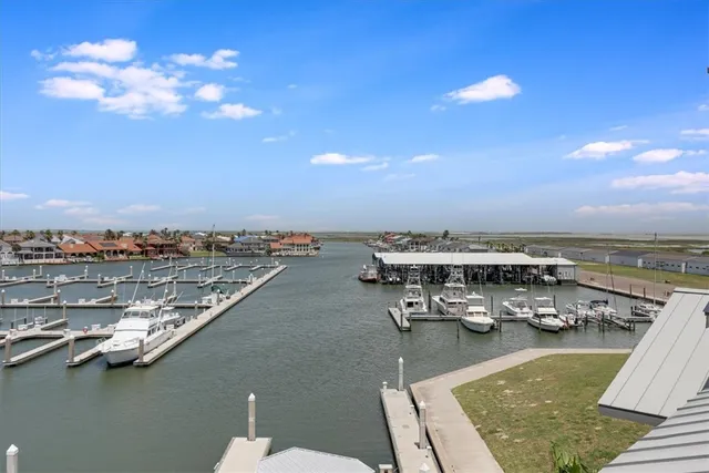 a view of a swimming pool with lounge chair