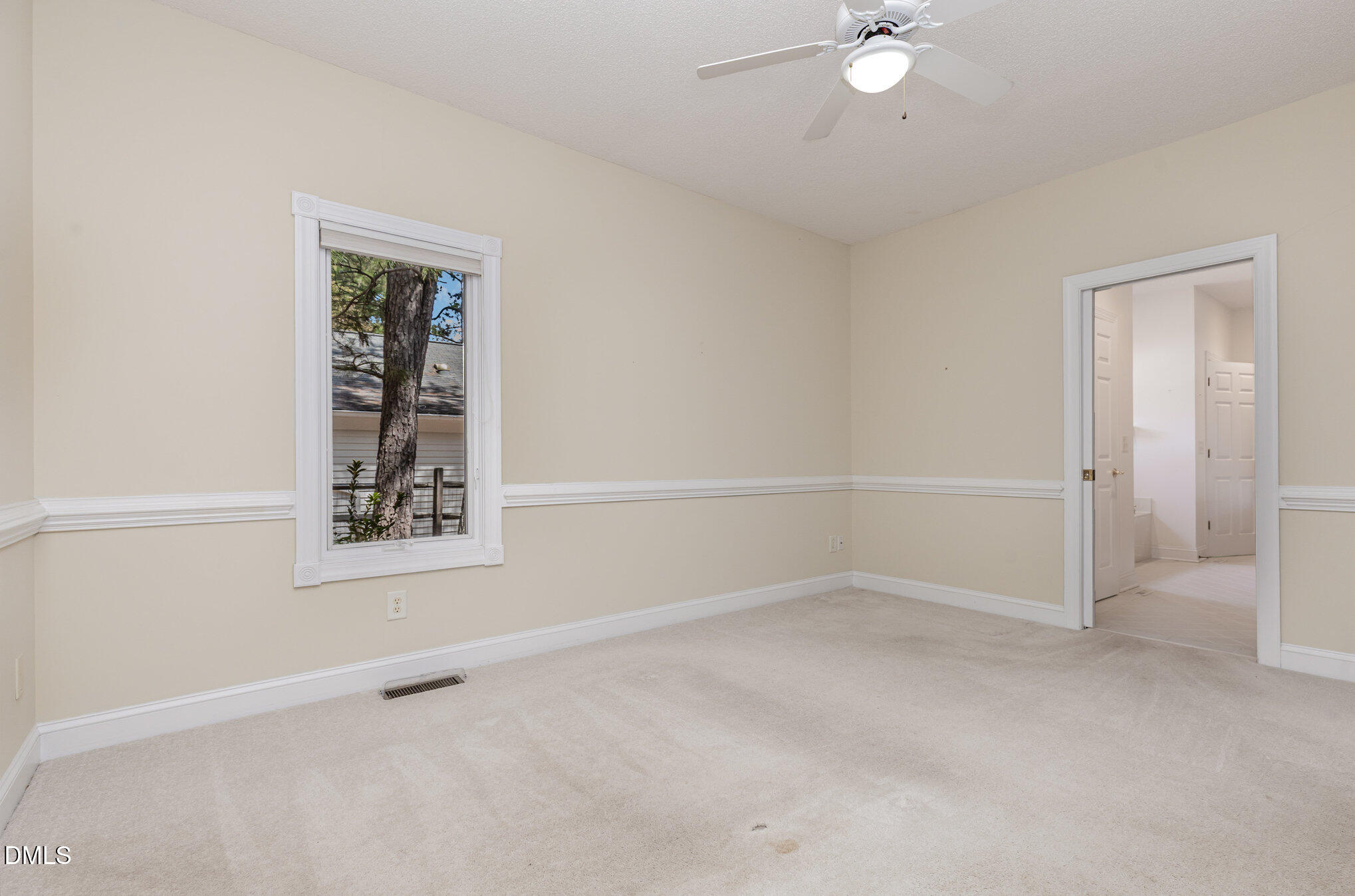 5 Pinyon Lane Pinehurst, NC 28374 - Photo 26 of 37 an empty room with windows and fan