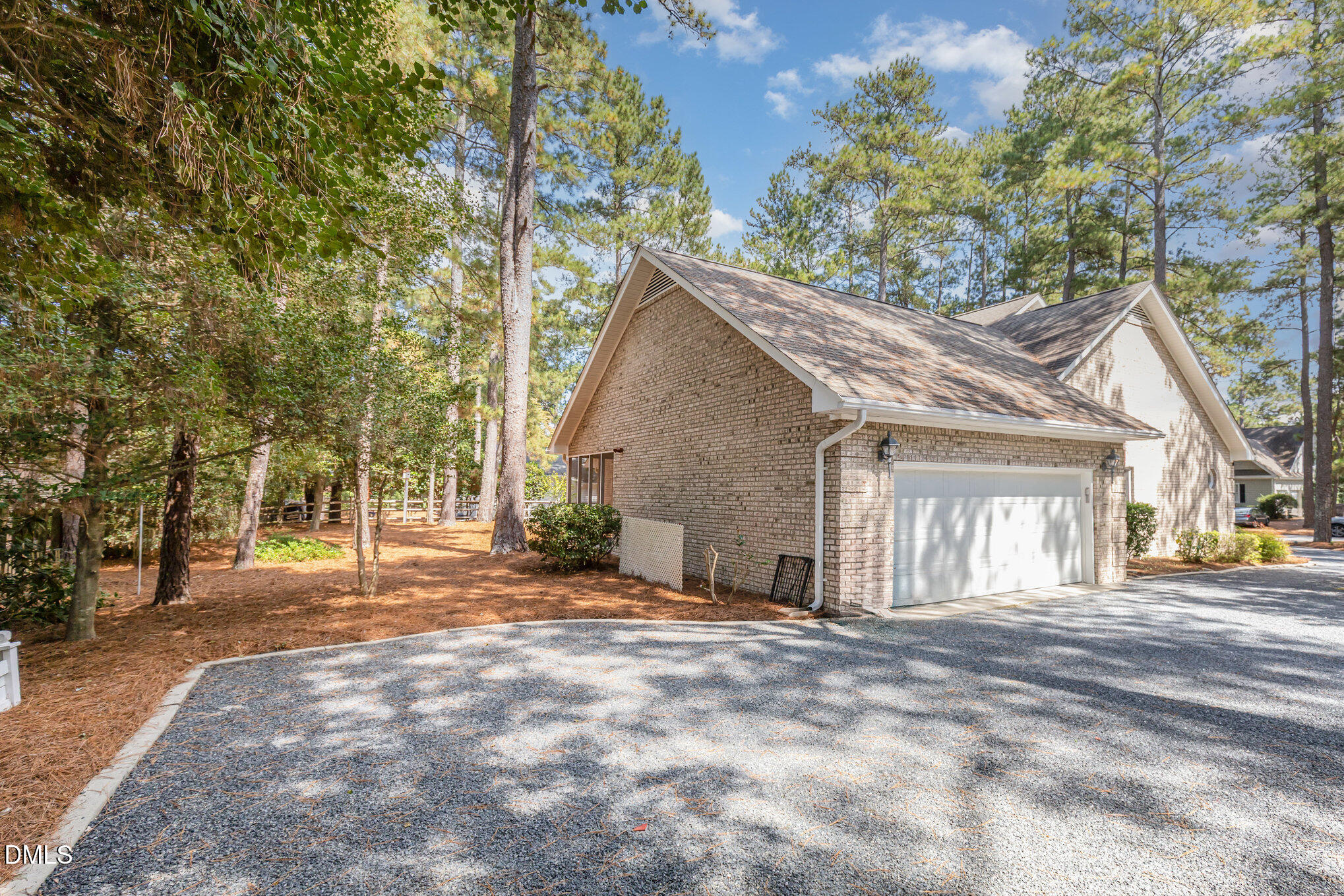 5 Pinyon Lane Pinehurst, NC 28374 - Photo 33 of 37 a view of a house with a yard and large tree