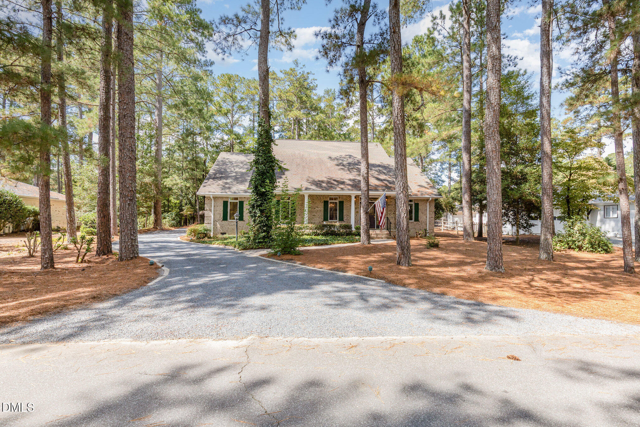 5 Pinyon Lane Pinehurst, NC 28374 - Photo 5 of 37 a view of a street with houses on both side