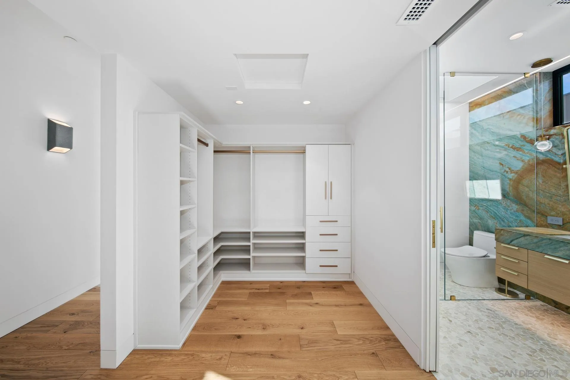 664 Cornish Drive Encinitas, CA 92024 - Photo 22 of 49 a view of a room with shelves