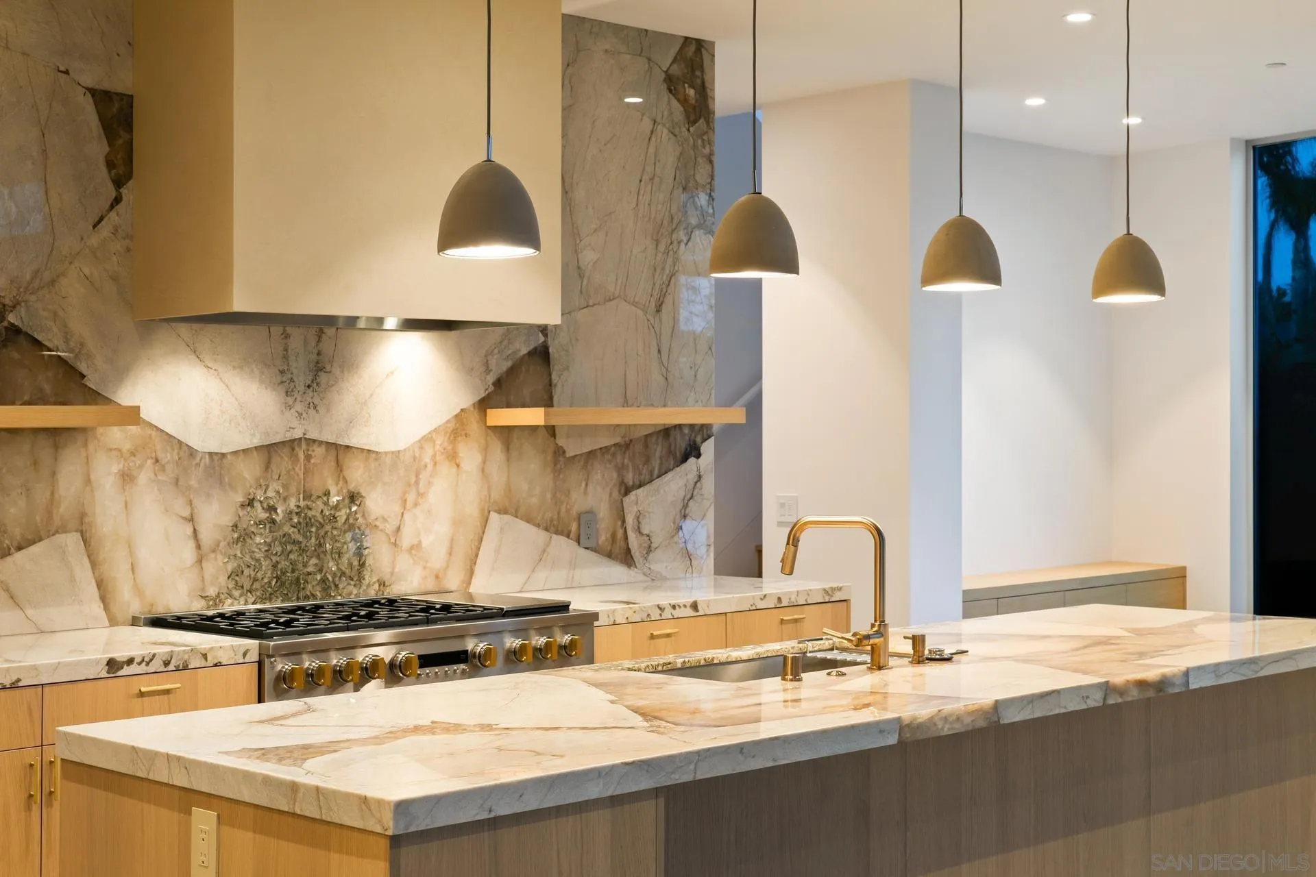 664 Cornish Drive Encinitas, CA 92024 - Photo 36 of 49 a kitchen with a stove and a sink