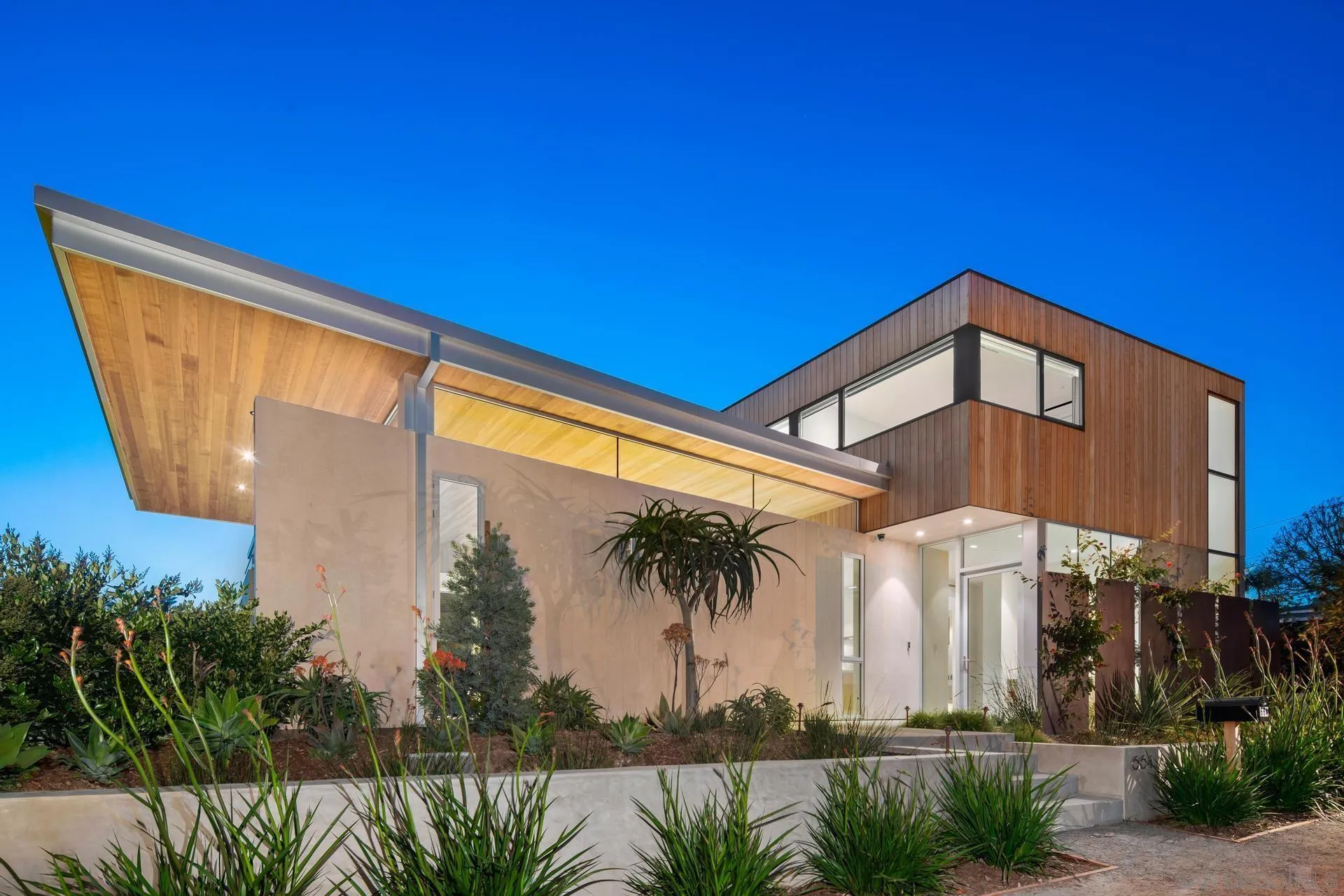 664 Cornish Drive Encinitas, CA 92024 - Photo 4 of 49 a front view of a house with a yard