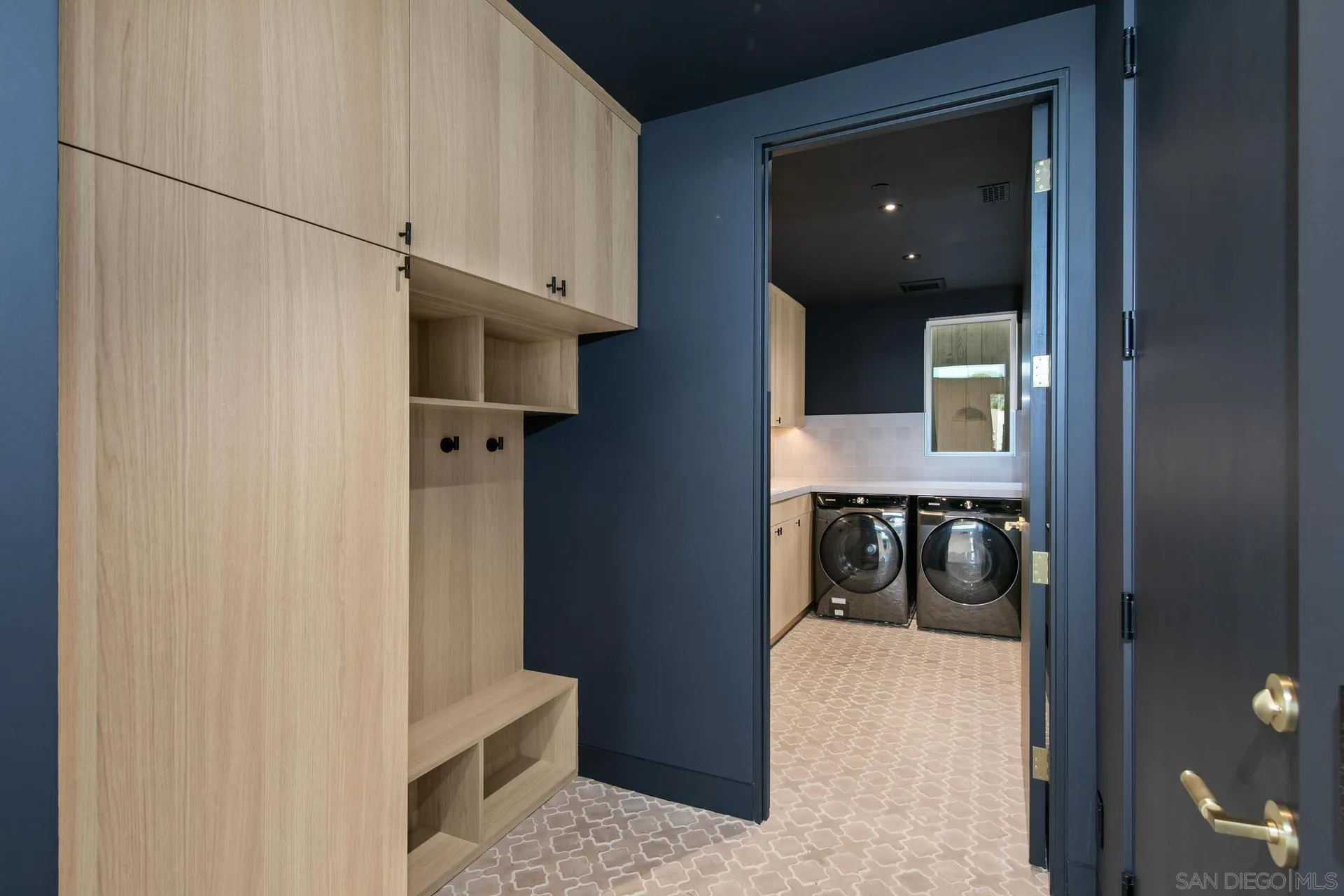 664 Cornish Drive Encinitas, CA 92024 - Photo 41 of 49 a utility room with dryer and washer