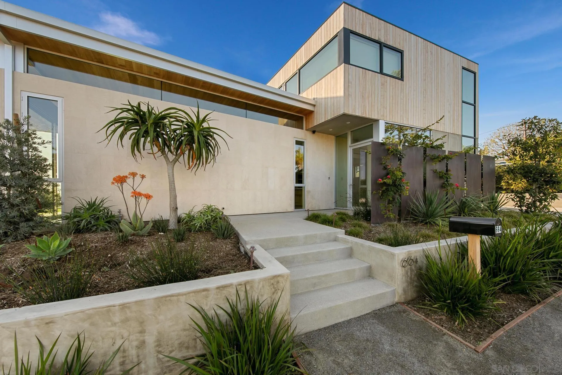 664 Cornish Drive Encinitas, CA 92024 - Photo 47 of 49 a front view of a house with garden