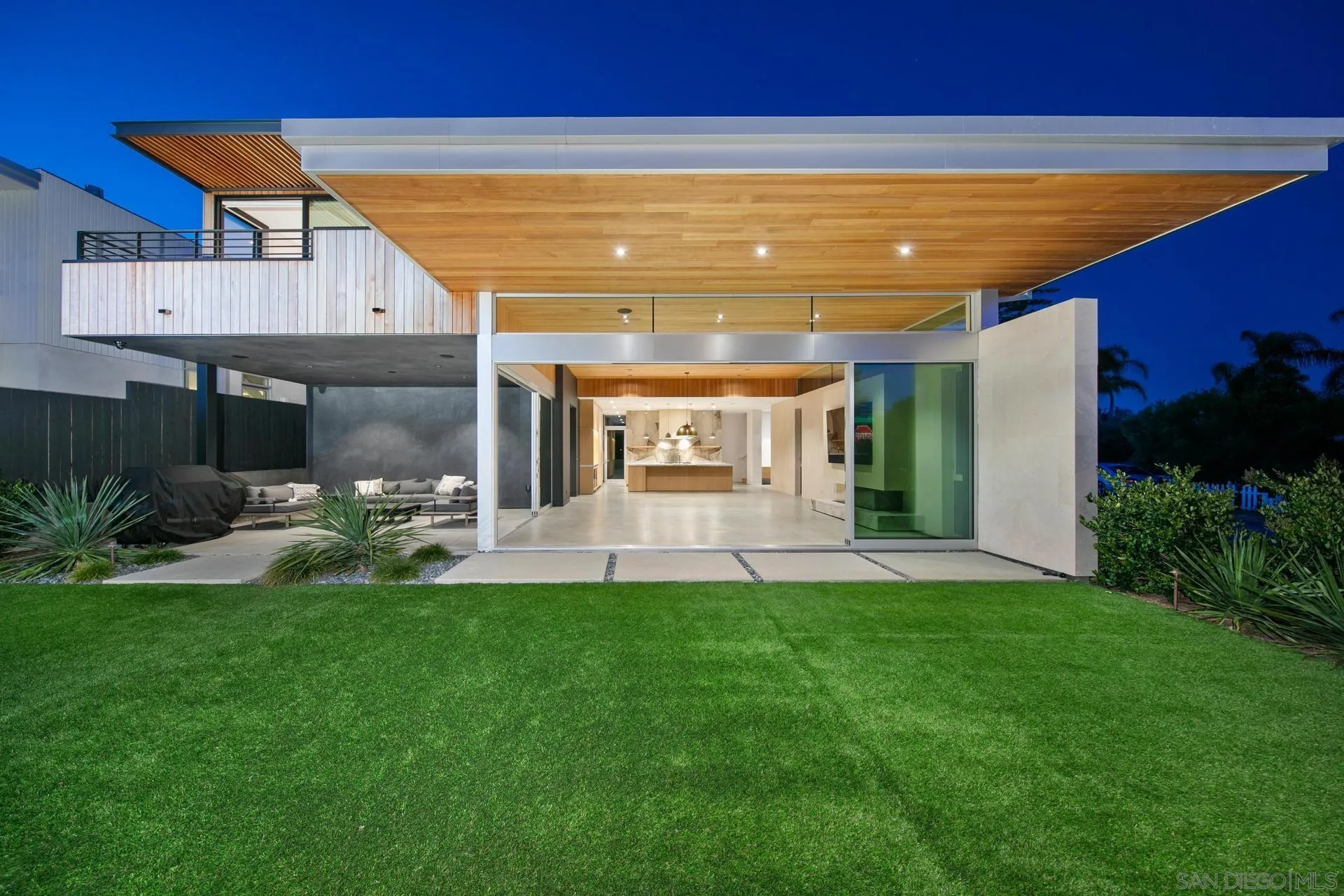 664 Cornish Drive Encinitas, CA 92024 - Photo 10 of 49 a view of a house with a backyard porch and sitting area