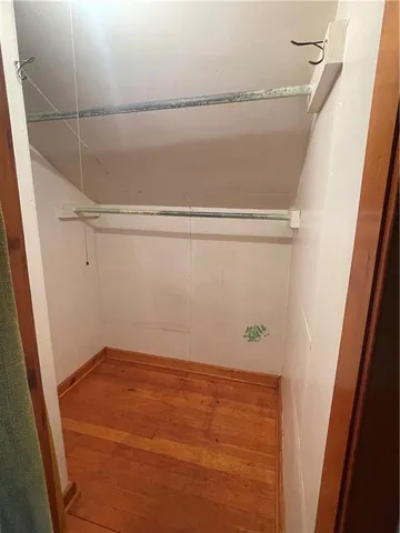 a view of small space with racks on the wall