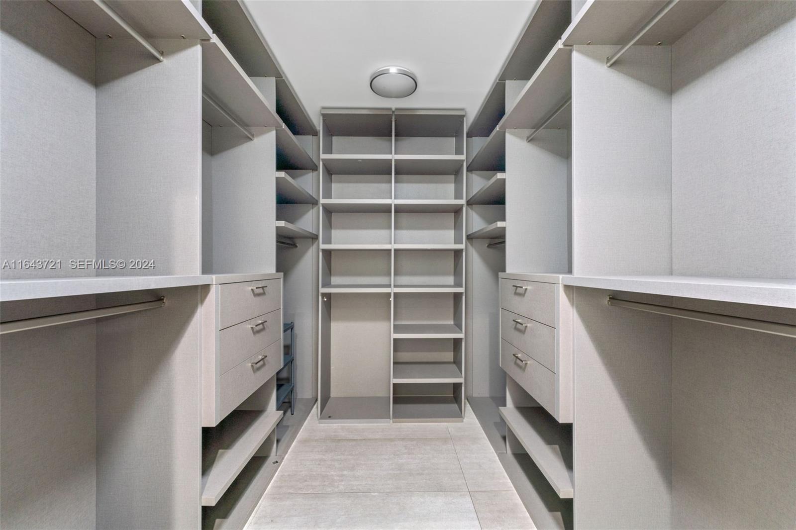 1510 Southwest 4th Avenue Miami, FL 33129 - Photo 19 of 46 a view of walk in closet with empty racks