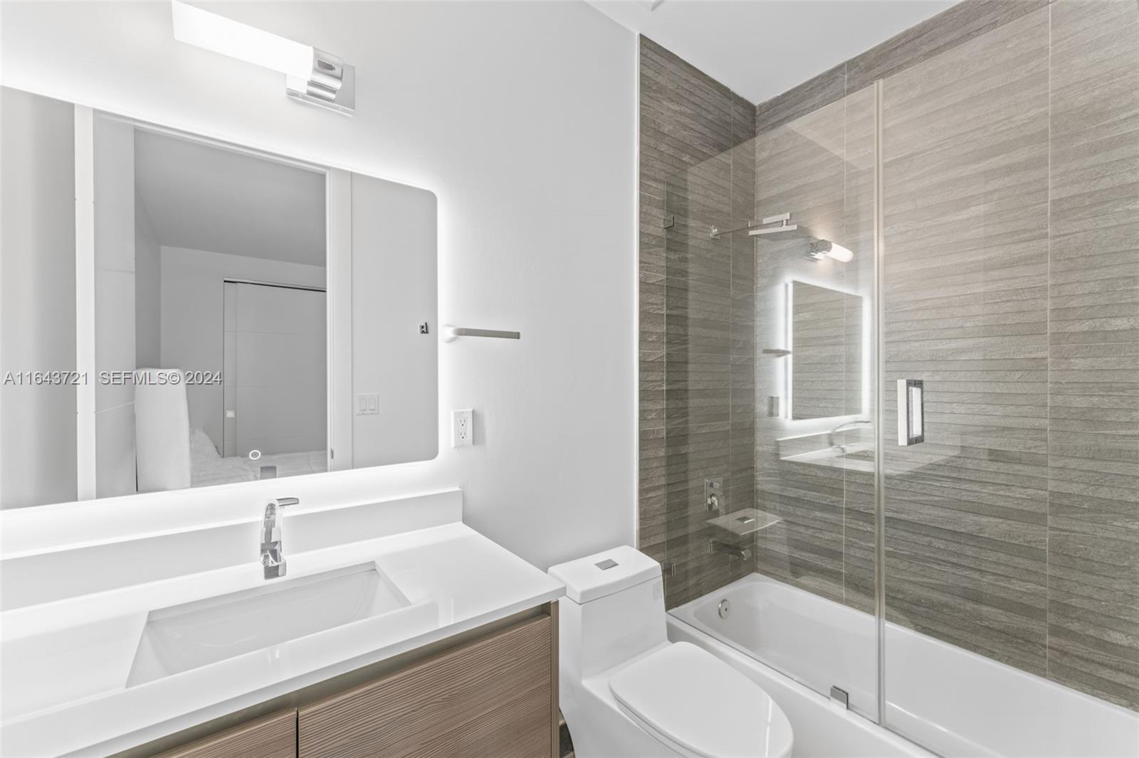 1510 Southwest 4th Avenue Miami, FL 33129 - Photo 22 of 46 a bathroom with a sink toilet vanity and shower