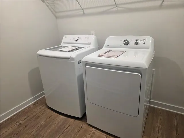 a utility room with dryer and washer