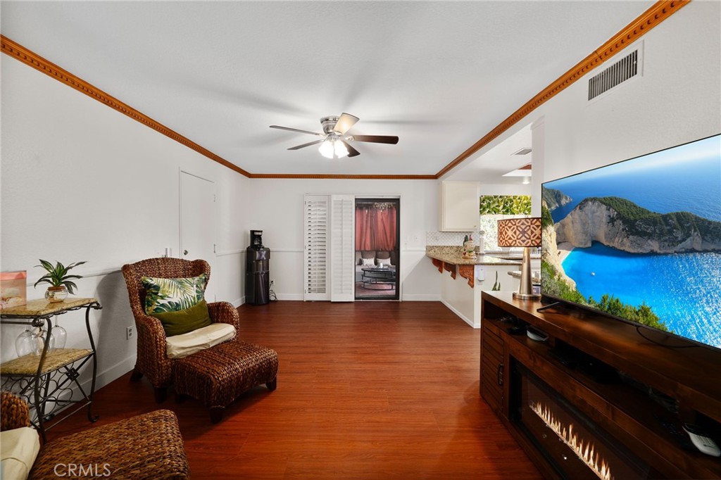 9637 Apricot Avenue Rancho Cucamonga, CA 91737 - Photo 18 of 44 a living room with furniture and a window