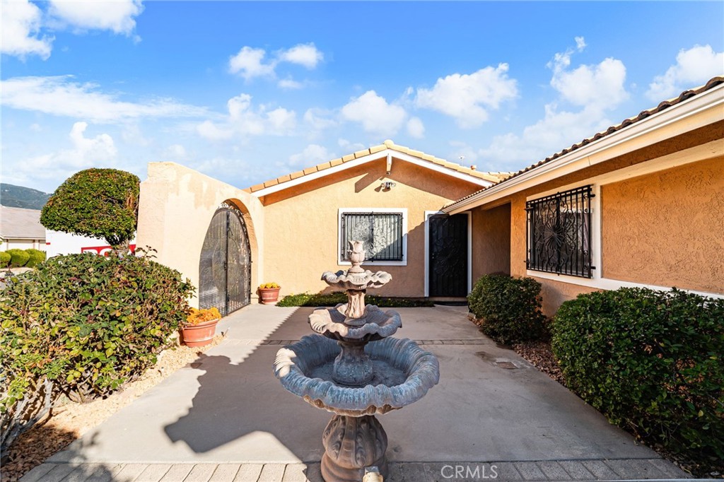 9637 Apricot Avenue Rancho Cucamonga, CA 91737 - Photo 37 of 44 a front view of a house with patio