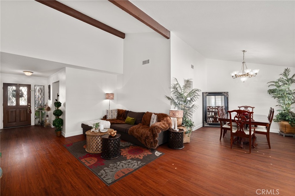 9637 Apricot Avenue Rancho Cucamonga, CA 91737 - Photo 10 of 44 a living room with furniture and a wooden floor