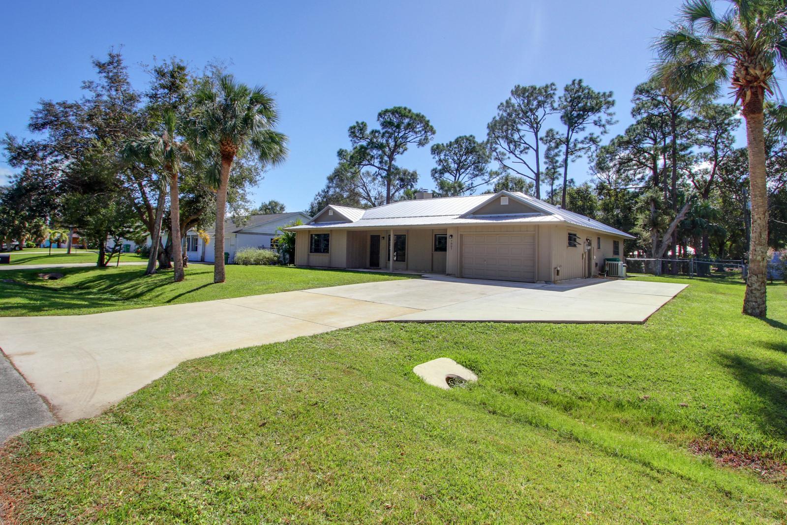 7807 Pensacola Road Fort Pierce, FL 34951 - Photo 2 of 25 Front sideview from street
