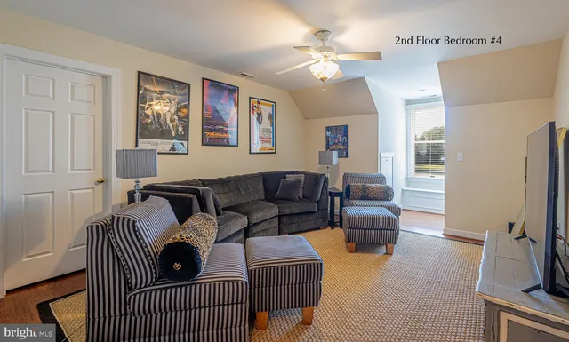 a view of a chairs and table in the balcony