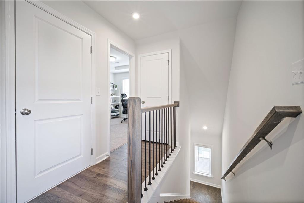 1595 Ridgebrook Downs Mableton, GA 30126 - Photo 16 of 39 a view of a hallway with staircase