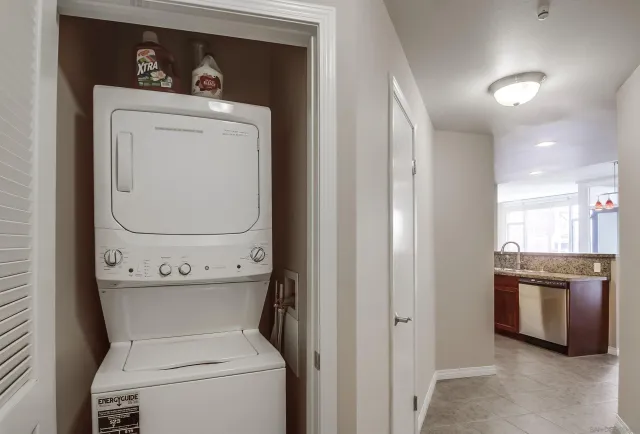 a couple of flower plants in front of building