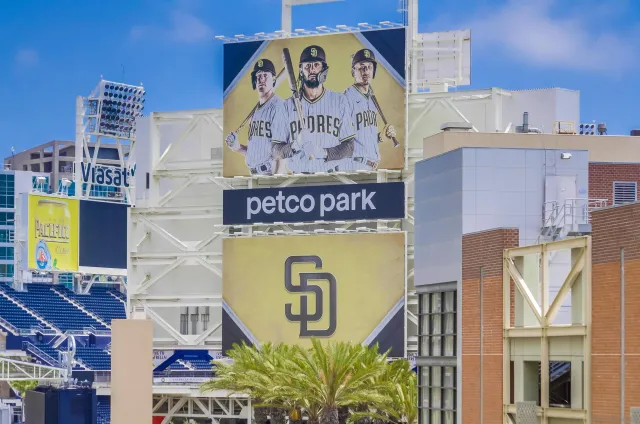 a view of a patio with a table and chairs and potted plants