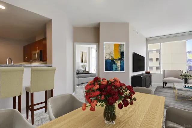 a hotel room with a bed and a flat screen tv