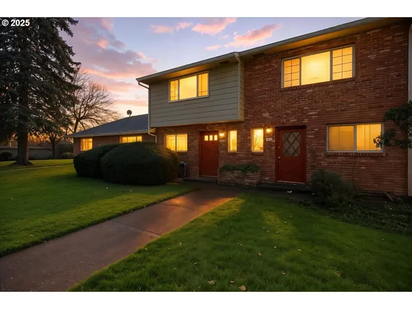a house view with a garden space