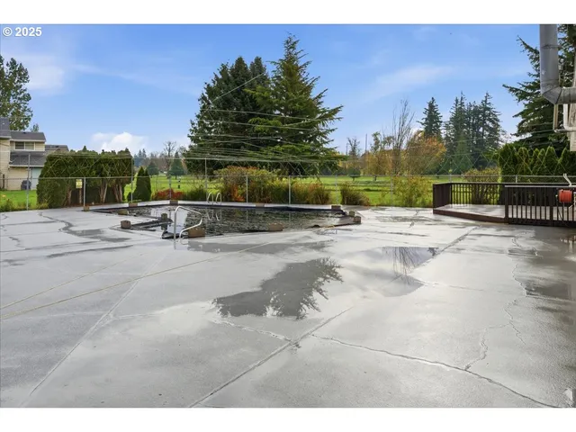 a view of a golf course with a lake