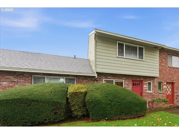 a sign on the wall of building