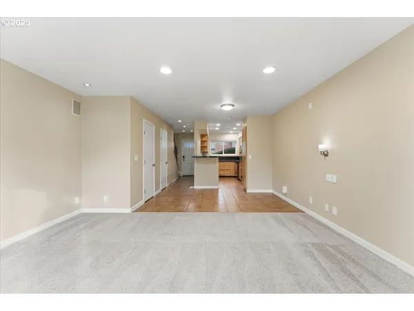 a view of kitchen and a window