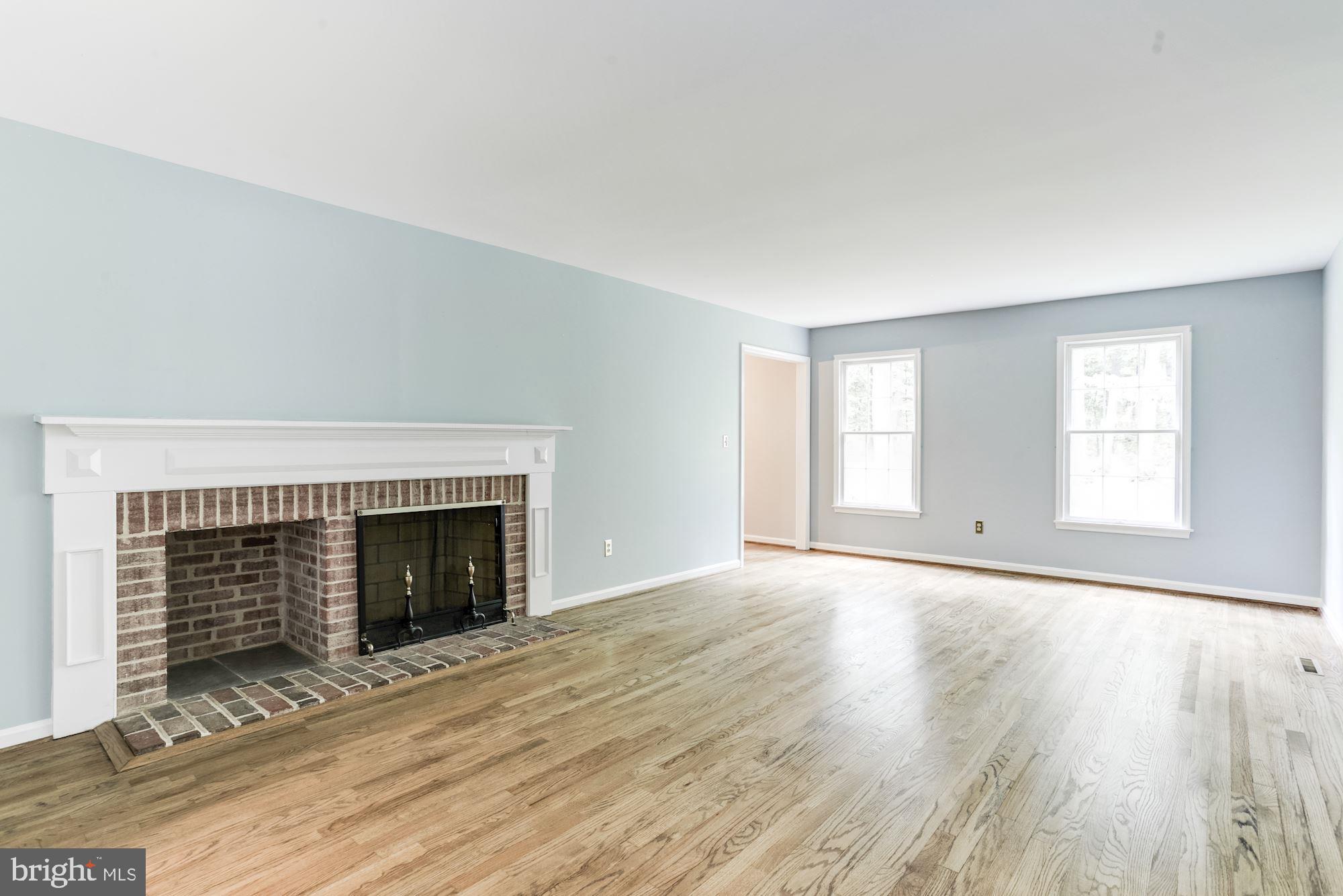 23208 Peach Tree Road Clarksburg, MD 20871 - Photo 21 of 51 Living room with wood burning stove