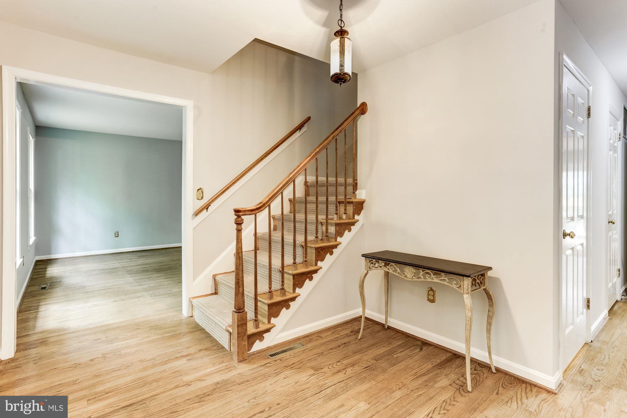 23208 Peach Tree Road Clarksburg, MD 20871 - Photo 5 of 51 Foyer with hardwood floors