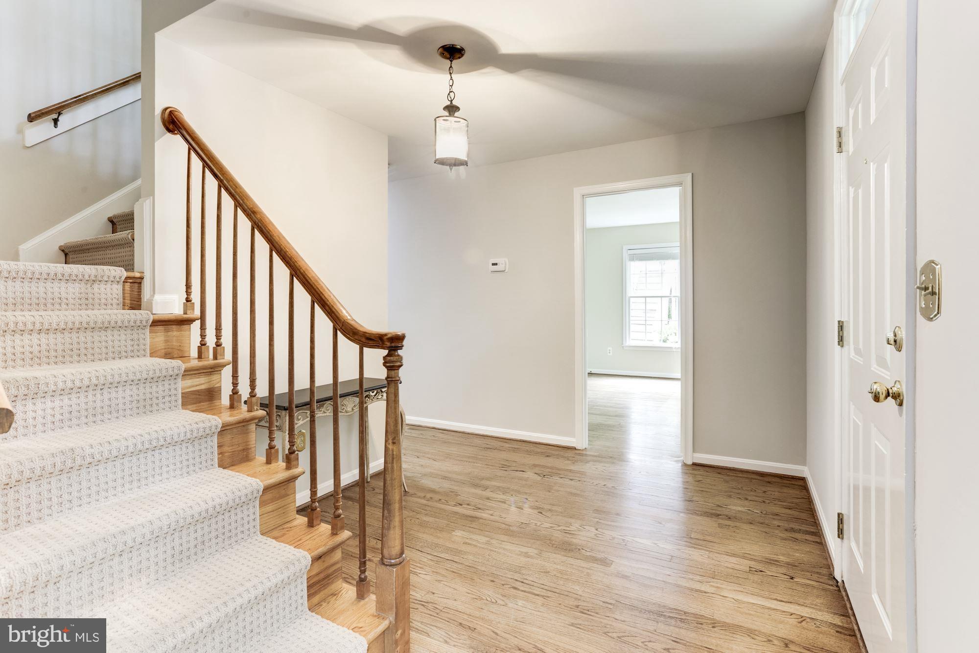 23208 Peach Tree Road Clarksburg, MD 20871 - Photo 6 of 51 Staircase to upper level