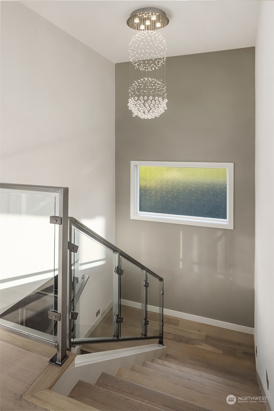 3900 Northeast 70th Street Seattle, WA 98115 - Photo 18 of 40 a view of a hallway with staircase