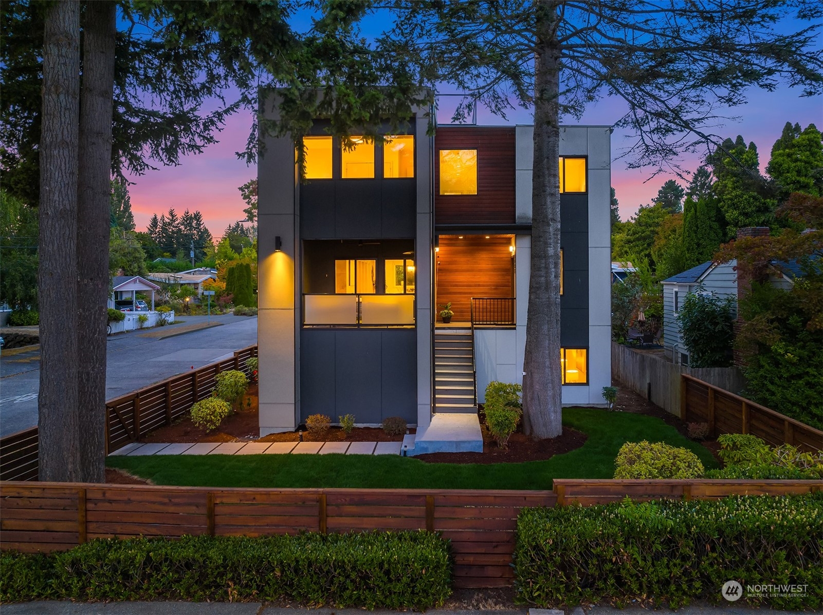 3900 Northeast 70th Street Seattle, WA 98115 - Photo 2 of 40 a front view of a house with a yard