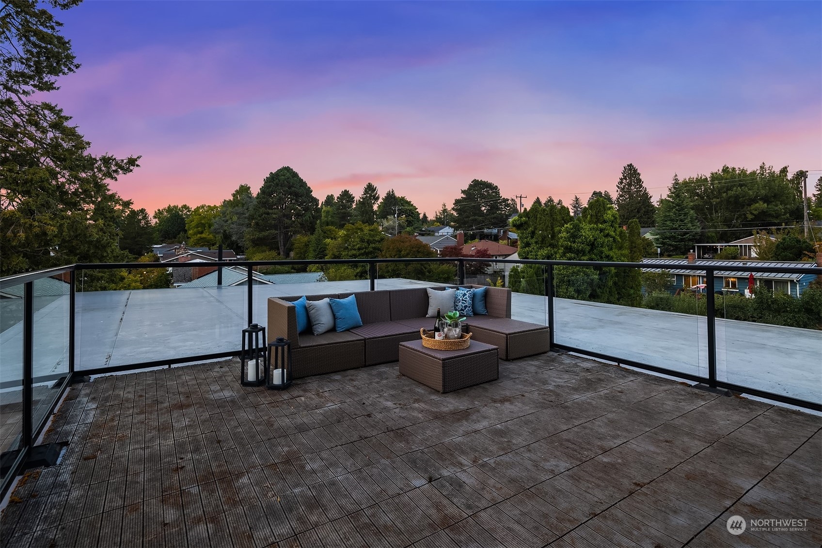 3900 Northeast 70th Street Seattle, WA 98115 - Photo 26 of 40 a view of a terrace with couches and sky view
