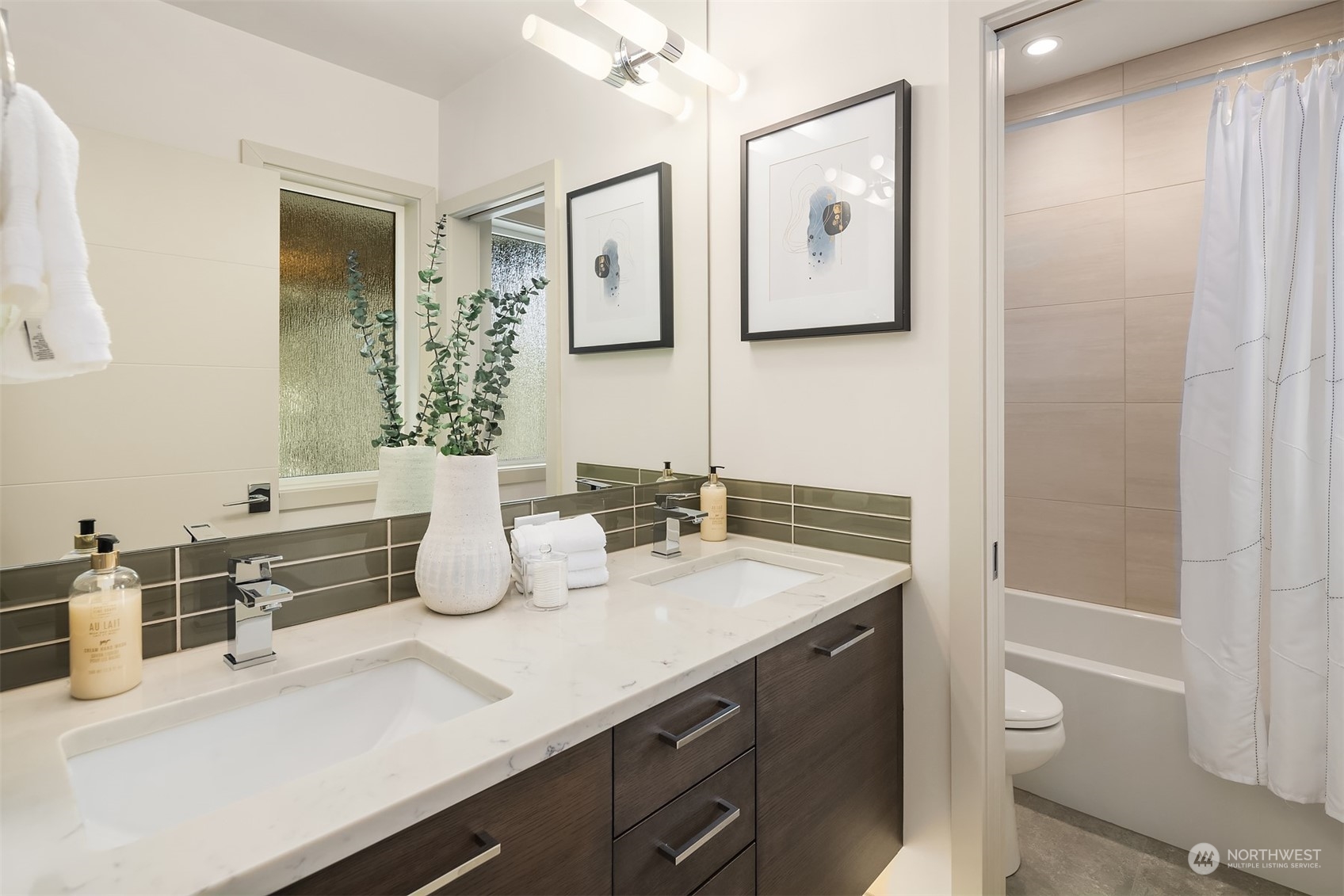 3900 Northeast 70th Street Seattle, WA 98115 - Photo 29 of 40 a bathroom with a granite countertop sink toilet and shower