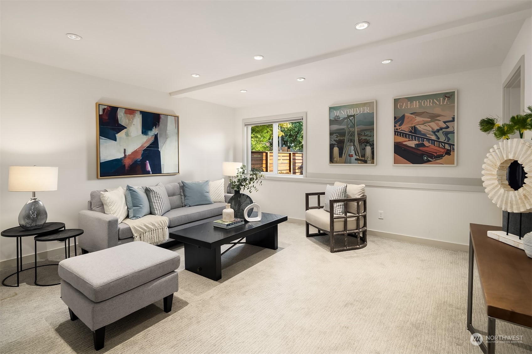 3900 Northeast 70th Street Seattle, WA 98115 - Photo 31 of 40 a living room with furniture and a painting on the wall