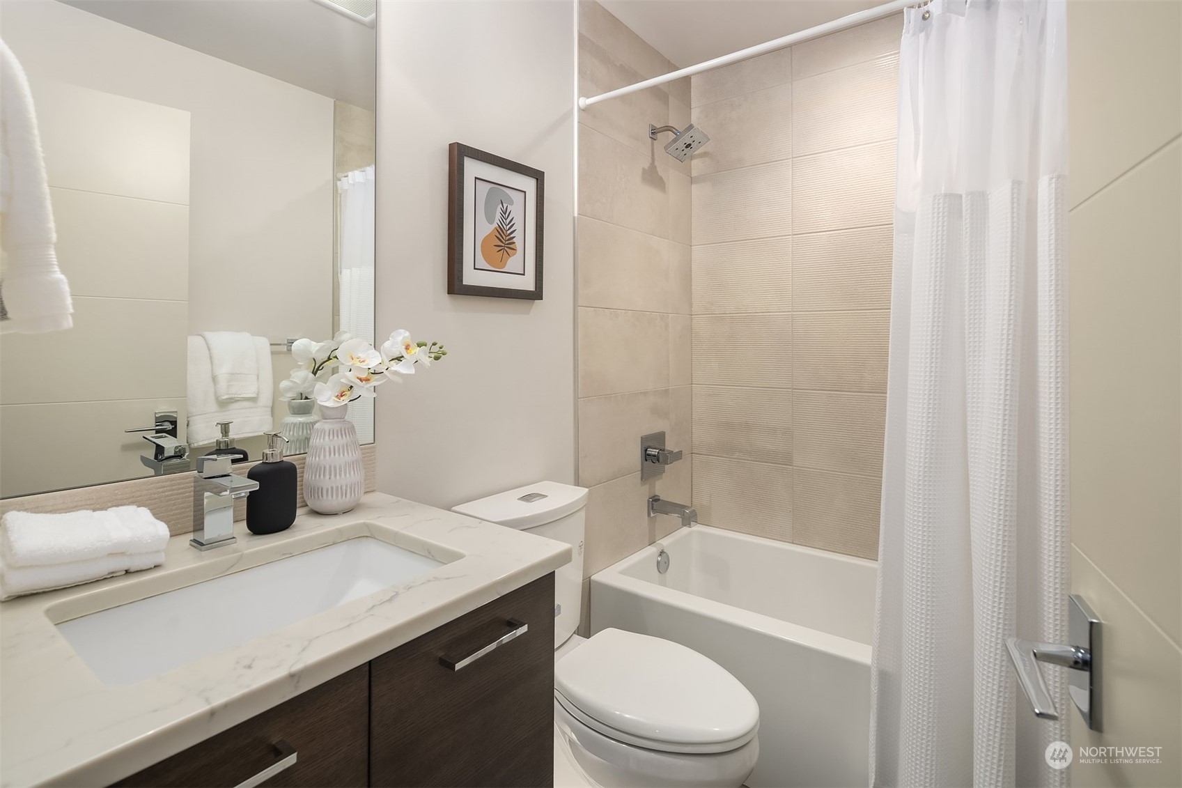 3900 Northeast 70th Street Seattle, WA 98115 - Photo 34 of 40 a bathroom with a sink a toilet and shower