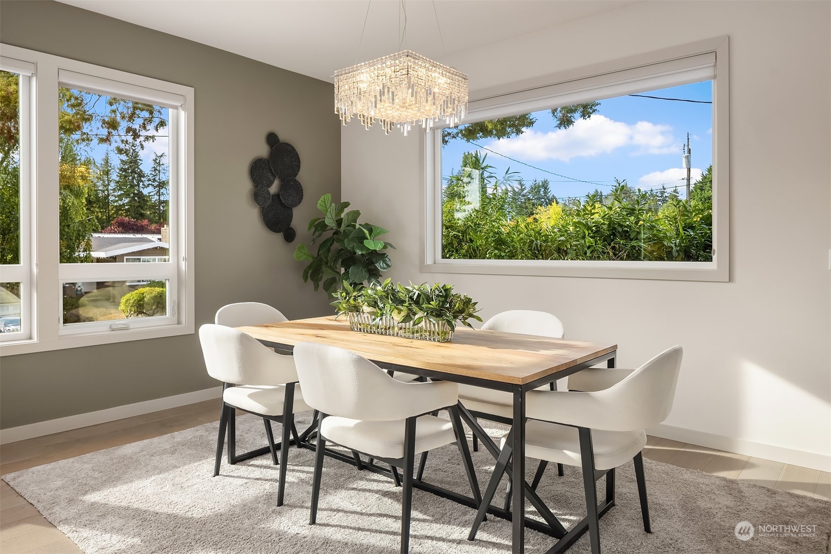 3900 Northeast 70th Street Seattle, WA 98115 - Photo 10 of 40 a view of a dining room with furniture window and outside view