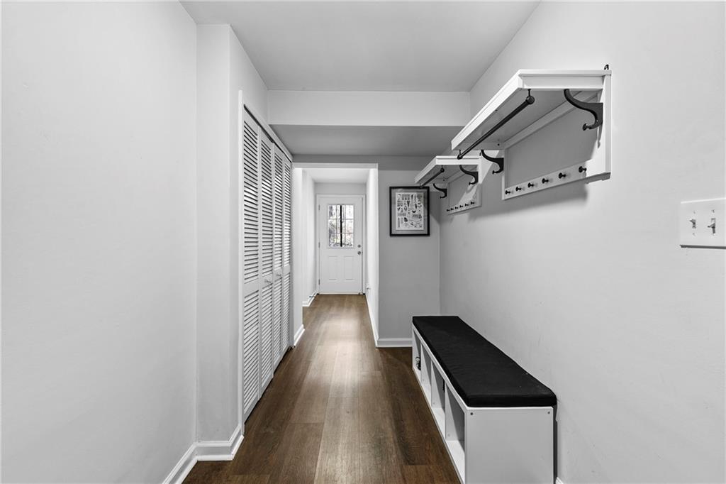 208 Shadowlawn Road Southeast Marietta, GA 30067 - Photo 14 of 25 an entryway in a hall with wooden floor