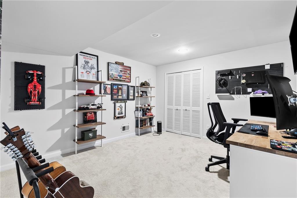 208 Shadowlawn Road Southeast Marietta, GA 30067 - Photo 20 of 25 a view of a workspace with furniture