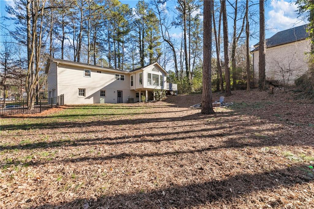 208 Shadowlawn Road Southeast Marietta, GA 30067 - Photo 23 of 25 a view of a house with a yard