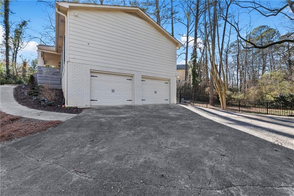 208 Shadowlawn Road Southeast Marietta, GA 30067 - Photo 24 of 25 a view of a house with a street