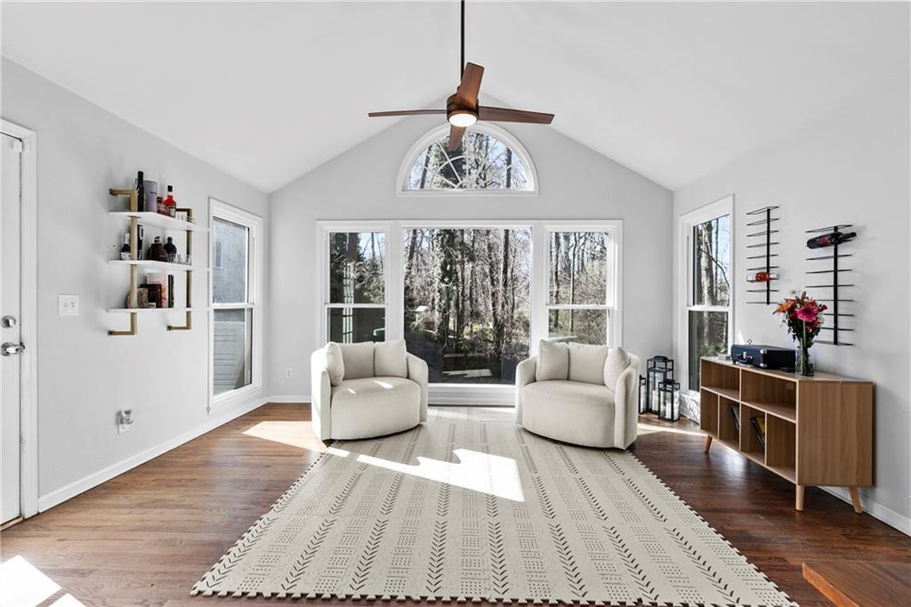 208 Shadowlawn Road Southeast Marietta, GA 30067 - Photo 5 of 25 a living room with furniture and wooden floor
