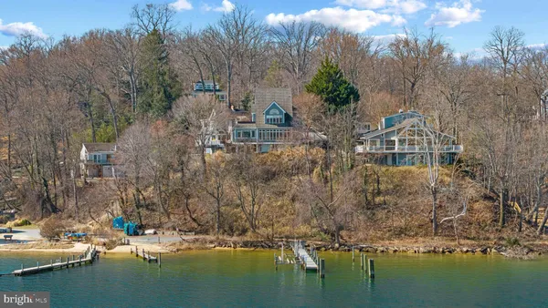 a view of house with ocean view