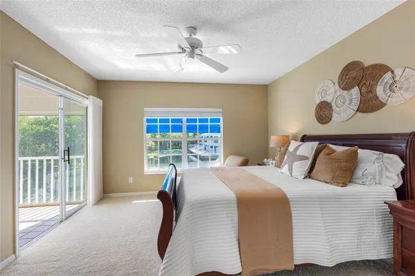 a aerial view of a house with a yard table and chairs