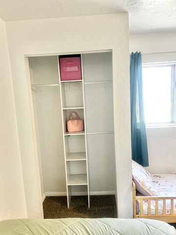 570 250 East Parowan, UT 84761 - Photo 13 of 27 Built-in closet system featuring white shelving and hanging rods