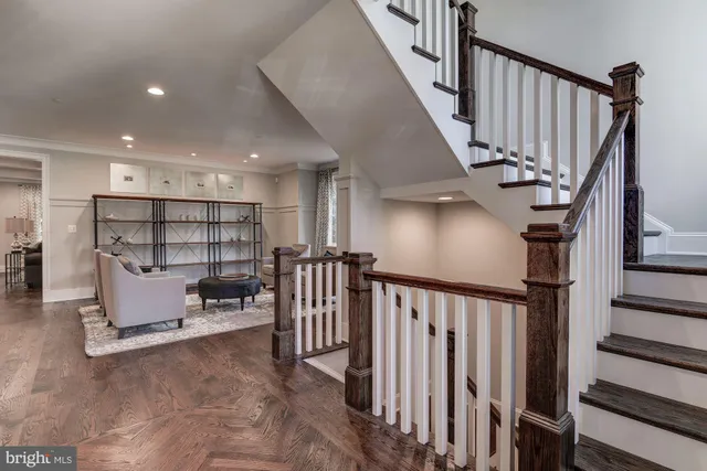 a view of staircase with wooden floor and stairs