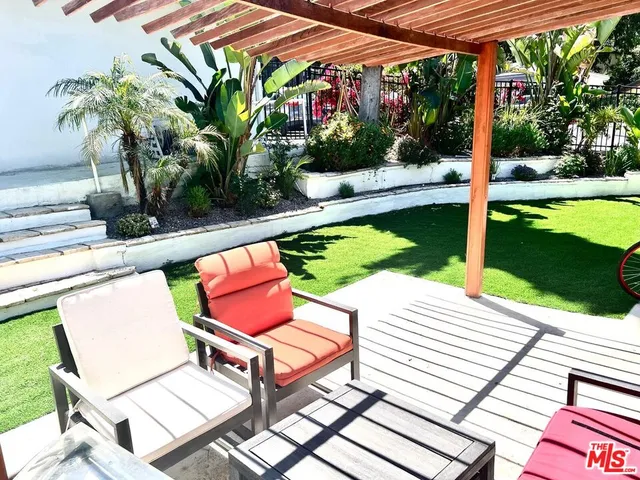 a view of swimming pool with a patio