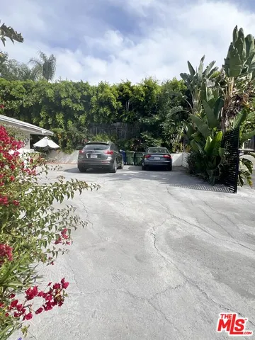a car parked in front of a house