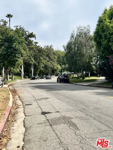 a view of street with houses
